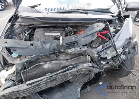 2010 Honda Insight Lx z USA, uszkodzony, nr VIN JHMZE2H5XAS038974